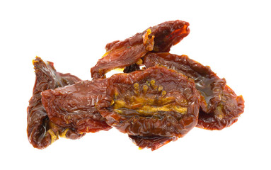 Sun dried tomatoes with olive oil on white background