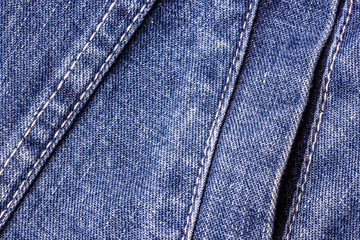 Fototapeta premium Blue jeans sew closeup texture.