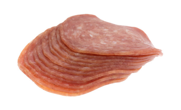 Side View Of Genoa Salami Slices On White Background