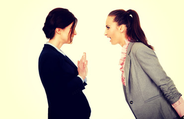 Two angry businesswomans.