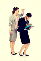 Woman try to get attention from her busy partner.