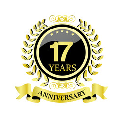 17 anniversary with glossy golden wreath and ribbon 