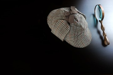 Sherlock Deerstalker Hat,   And Vintage  Magnifying Glass On Bla