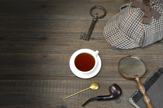 Sherlock Holmes Concept. Private Detective Tools On The Wood Tab