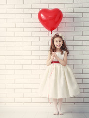 girl with red heart