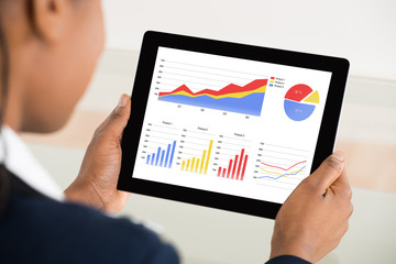 Businesswoman Analyzing Graph