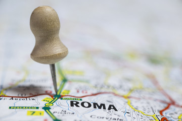 Pin indicates the destination on the road map - Roma (Italy)