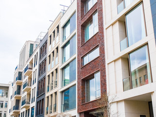 Row of various apartment building windows