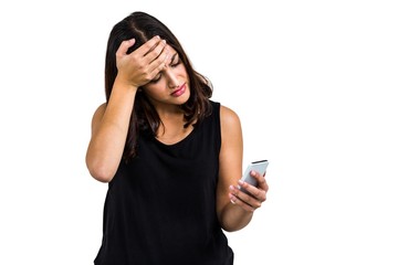 Sad woman using phone