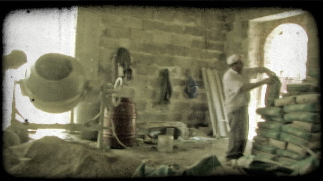 Mixing Concrete. Vintage stylized video clip.