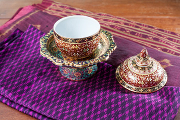 Thai Ceramic "Benjarong" on Thai silk