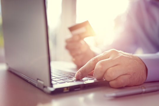 Online shopping with credit card and laptop computer