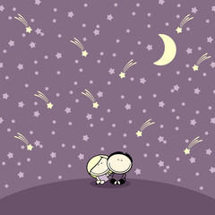 Couple sitting under night starry sky