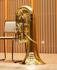 Golden tuba in the concert hall.Wind instrument. Copper musical instrument
