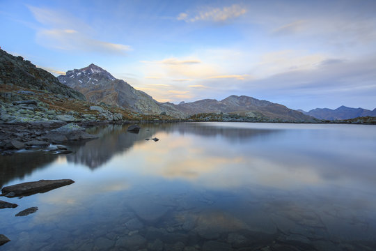Peak Tambo reflected in Lake Bergsee at dawn, Chiavenna Valley, Spluga Valley