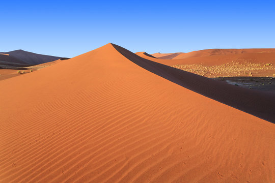 Shadow and light among the sand dunes shaped by wind, Deadvlei, Sossusvlei, Namib Desert, Namib Naukluft National Park, Namibia