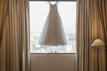 Wedding dress on window