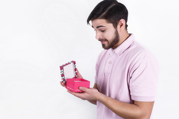 Happy emotional man with gifts on special day