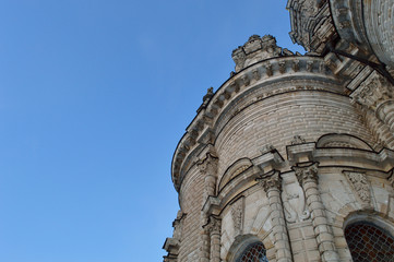 Fototapeta na wymiar Beautiful Catholic church against a bright blue sky