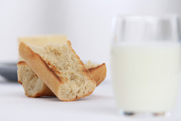 close up of a breakfast with toast and milk