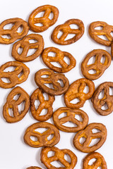 Pile of pretzels on a white surface