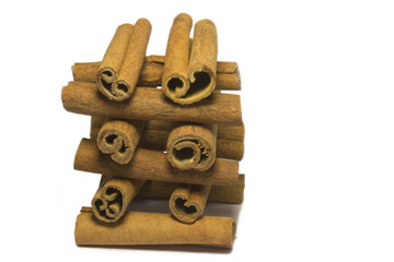 Cinnamon sticks on white background