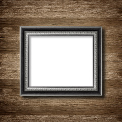 picture frame on wooden wall background