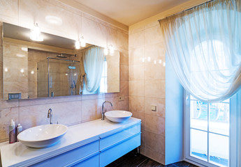 Closeup of water-supply faucet in modern bathroom