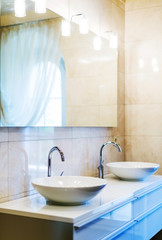 Closeup of water-supply faucet in modern bathroom