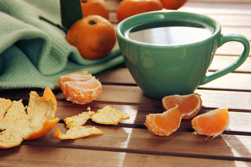 warming composition - Orange tangerine and mandarin slices, green  cup of tea