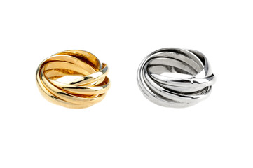silver and golden rings isolated on white