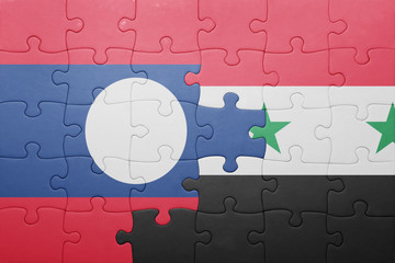 puzzle with the national flag of laos and syria