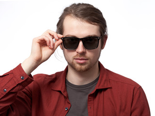 Portrait of a serious man in sunglasses