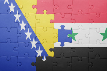 puzzle with the national flag of bosnia and herzegovina and syria