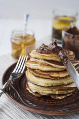 Pancakes with chocolate and honey