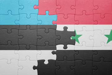 puzzle with the national flag of estonia and syria