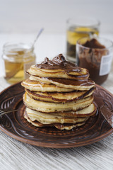 Pancakes with chocolate and honey