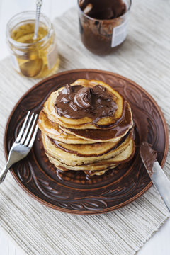 Pancakes with chocolate and honey
