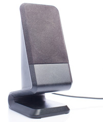 black desktop speakers on white background