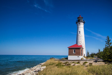 Fototapeta na wymiar Crisp Point Lighthouse. Built in 1875, the lighthouse is located in Michigan's Upper Peninsula on the remote shores of Lake Superior.
