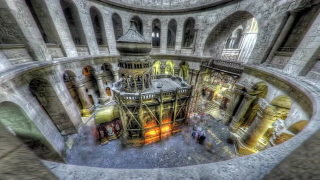 Shot of the Edicule of the Holy Sepulchral time-lapse of tourists walking around.