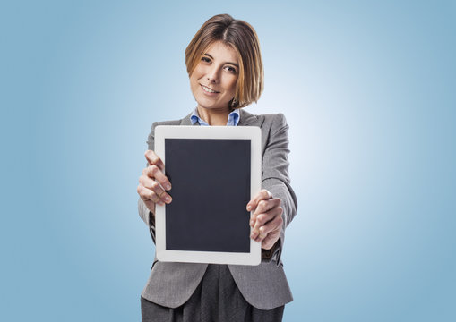 beautiful young business woman showing her tablet