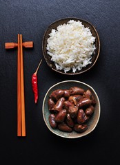 heart chicken stew in white wine, soy sauce, garlic, chili and parsley