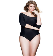 Beautiful plump woman with blond hair and blue eyes in the body