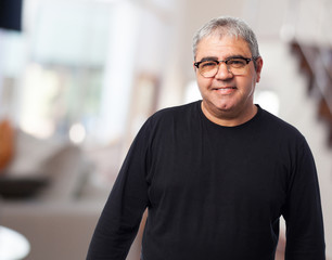 portrait of a mature man wearing glasses