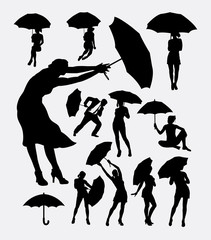 People with umbrella action silhouette. Good use for symbol, web icon, logo, sign, mascot, or any design, you want. Easy to use.