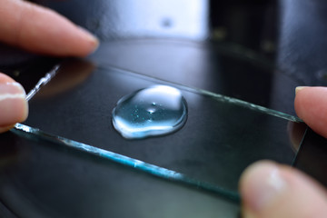 hands examining samples