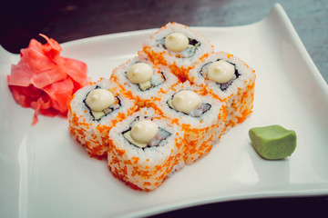 Sushi on a white plate