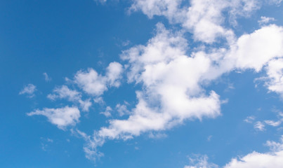 White clouds in blue sky.