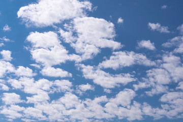 White clouds in blue sky.